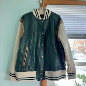 New never worn women varsity jacket
